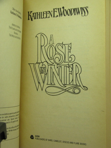 a rose in winter by kathleen e woodiwiss